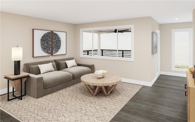 living room featuring ceiling fan and dark hardwood / wood-style floors