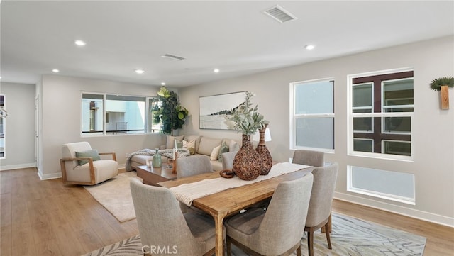 dining area with light wood-type flooring