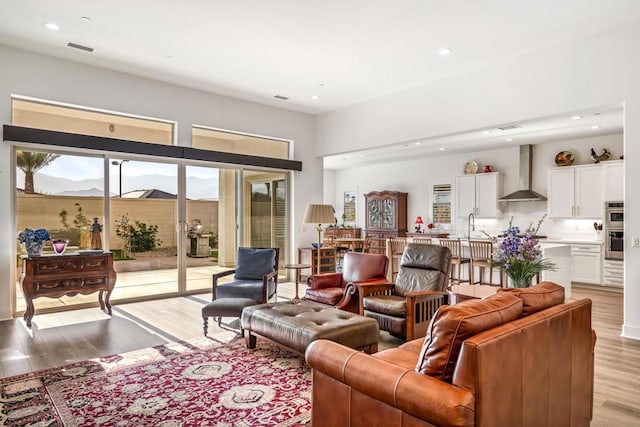 living room with light wood-type flooring