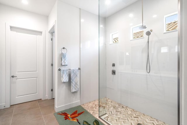 bathroom featuring tile patterned flooring and walk in shower