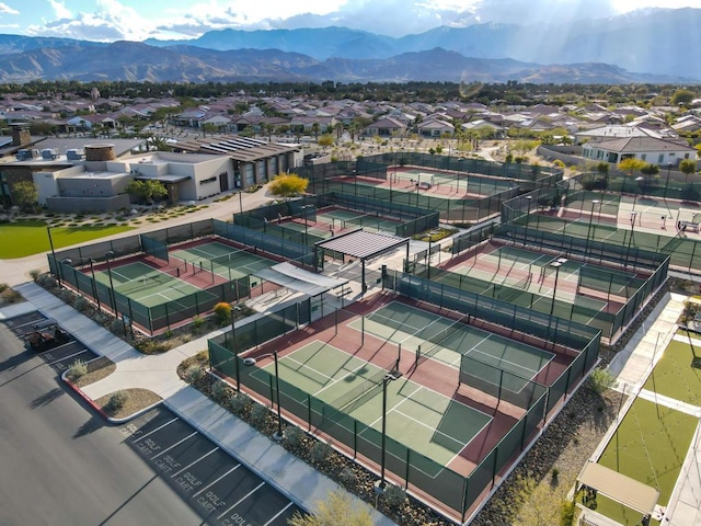 birds eye view of property featuring a mountain view