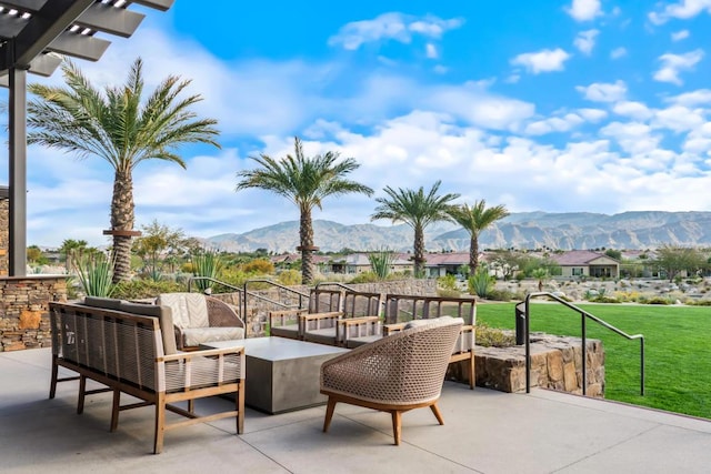 view of patio / terrace featuring outdoor lounge area and a mountain view