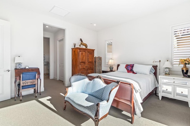 bedroom featuring light colored carpet