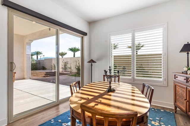 dining room featuring light wood-type flooring