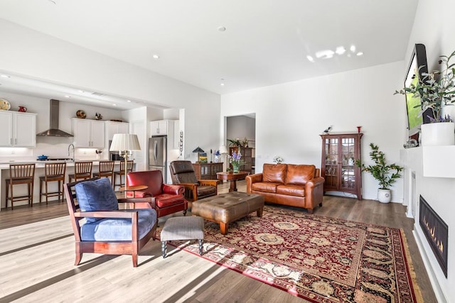 living room with light hardwood / wood-style floors