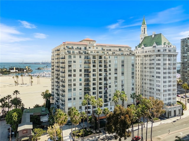 view of property with a water view