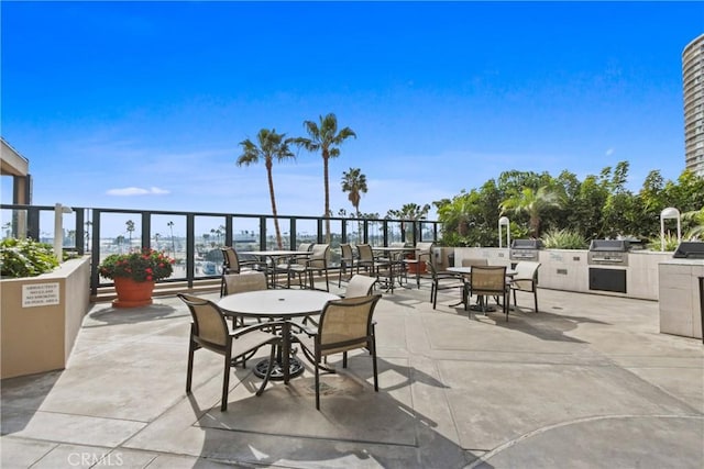 view of patio with exterior kitchen