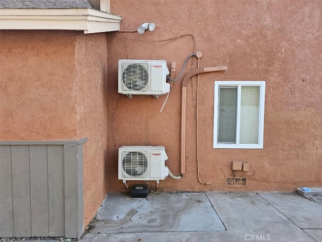 exterior space featuring ac unit