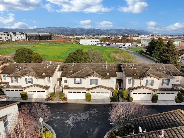 bird's eye view with a mountain view