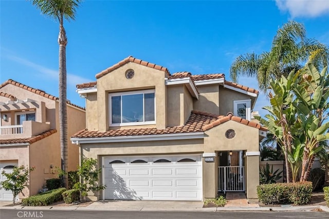 mediterranean / spanish-style house featuring a garage