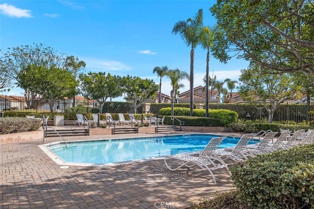 view of pool featuring a patio