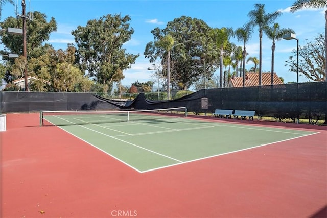 view of tennis court with basketball court