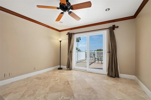 spare room with crown molding and ceiling fan