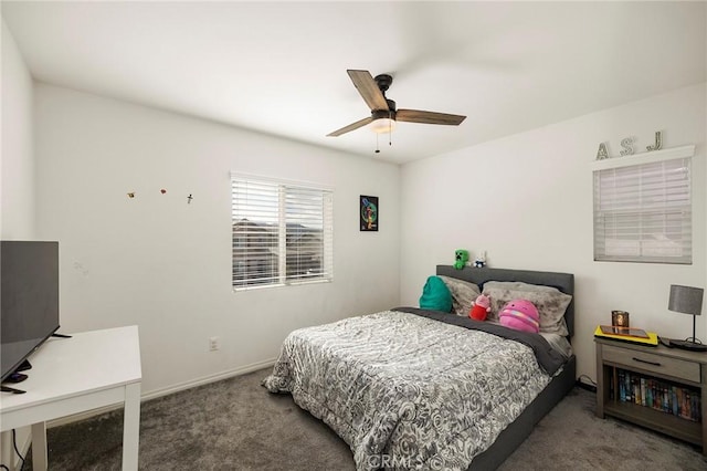 bedroom with ceiling fan and carpet