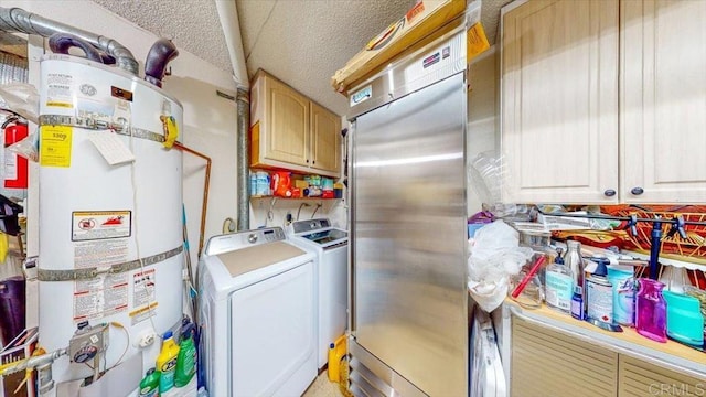 interior space featuring separate washer and dryer, cabinets, and water heater