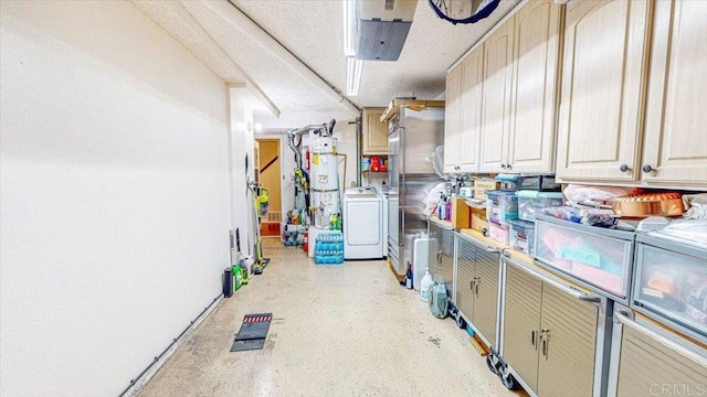 basement featuring washer and dryer and secured water heater