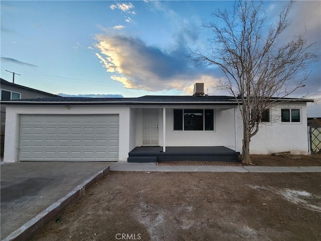 single story home featuring a garage