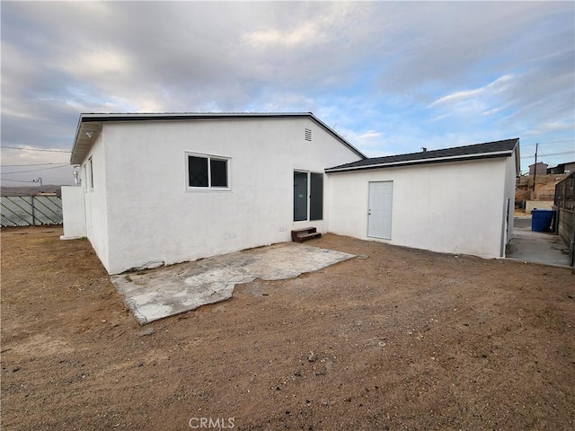 back of house featuring a patio area