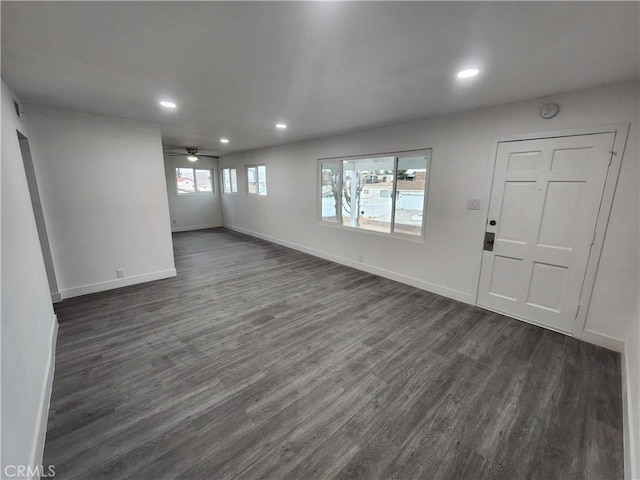 entrance foyer with dark wood-type flooring and ceiling fan