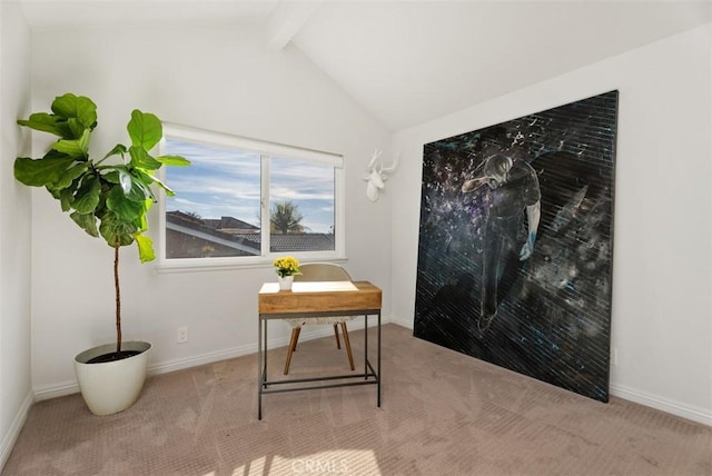 carpeted home office featuring vaulted ceiling with beams