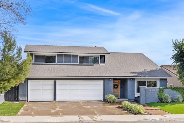 view of front of home with a garage