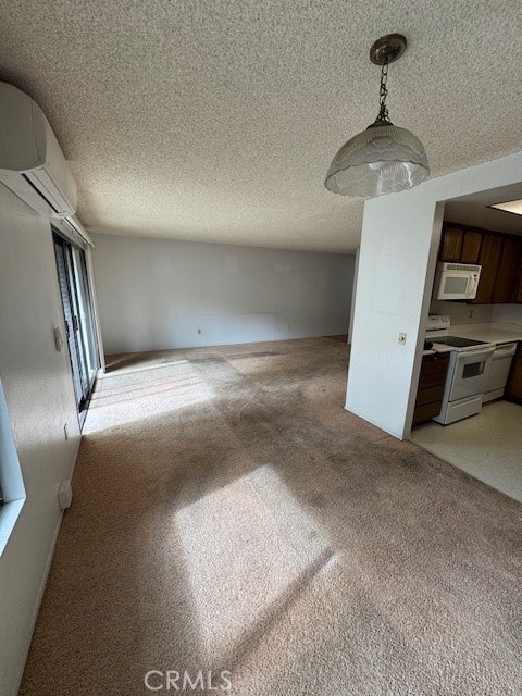 unfurnished living room featuring a textured ceiling, light carpet, and an AC wall unit