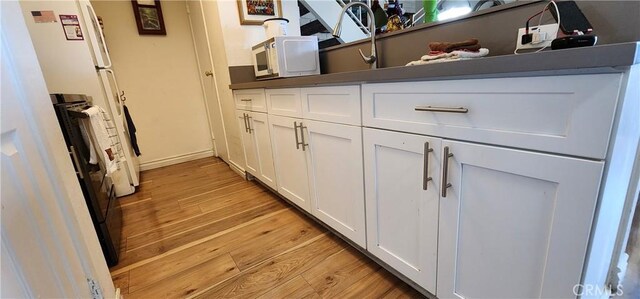 interior space with hardwood / wood-style flooring