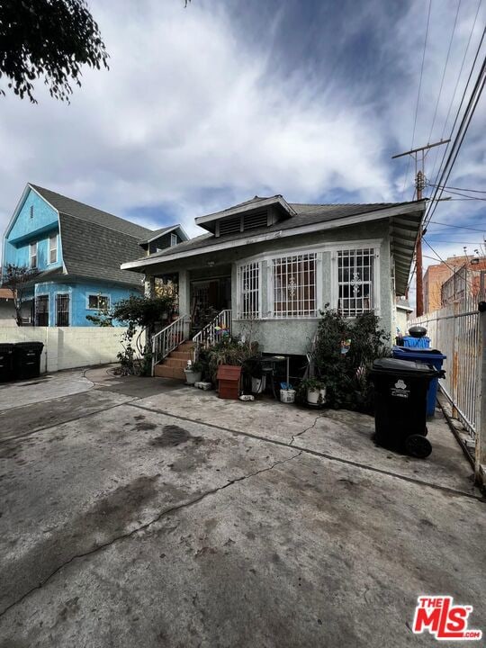 back of property featuring a patio