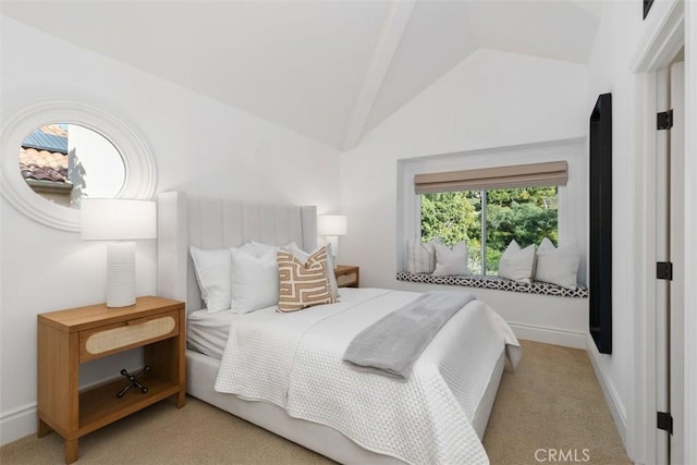 bedroom featuring carpet flooring, vaulted ceiling, and baseboards