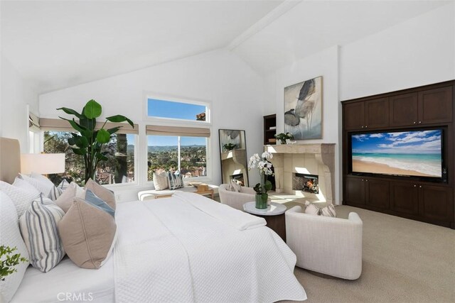 35 Brindisi, Laguna Niguel, CA 92677 - bedroom featuring high vaulted ceiling, a lit fireplace, carpet floors, and beamed ceiling