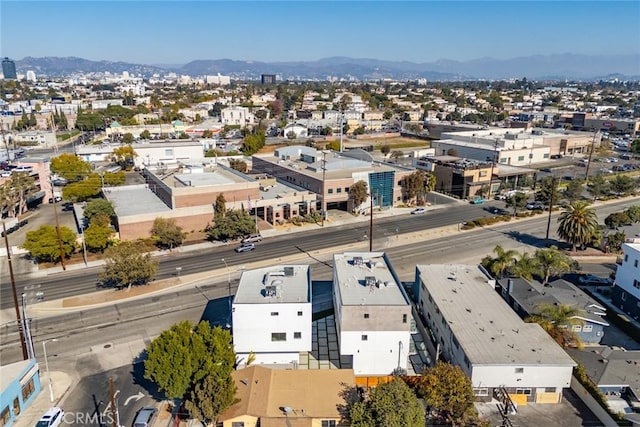 drone / aerial view featuring a mountain view