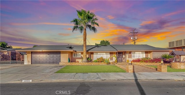 ranch-style home with a garage