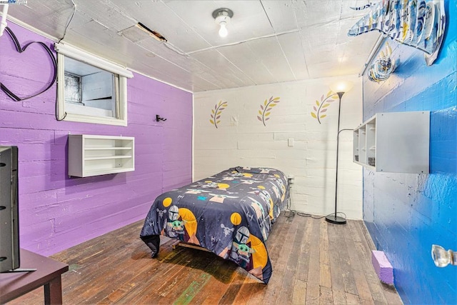 bedroom featuring wood-type flooring