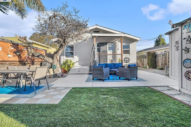 exterior space with a lawn, outdoor lounge area, and a patio