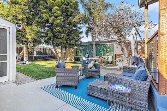 view of patio / terrace with an outdoor hangout area and a trampoline