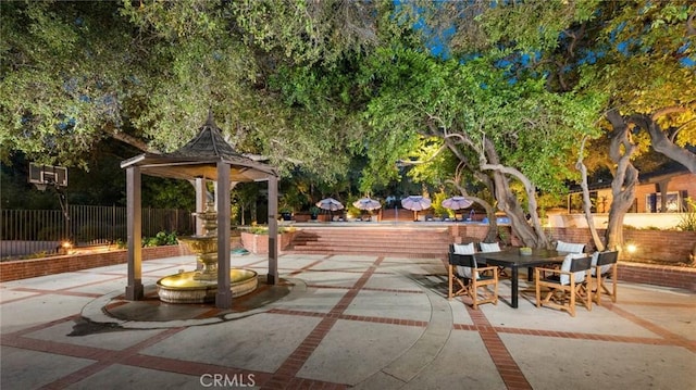 view of home's community featuring a gazebo and a patio area