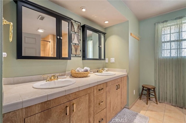 bathroom featuring vanity and tile patterned floors