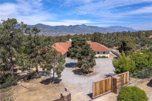 birds eye view of property with a mountain view