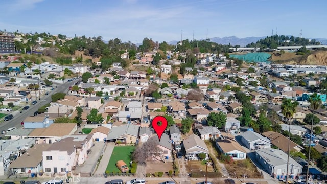 birds eye view of property featuring a residential view and a mountain view