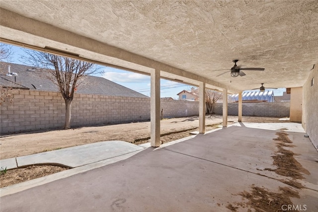 view of patio / terrace featuring ceiling fan