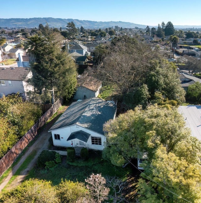 drone / aerial view featuring a mountain view