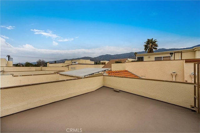 view of patio / terrace with a mountain view