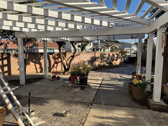 view of patio featuring a pergola