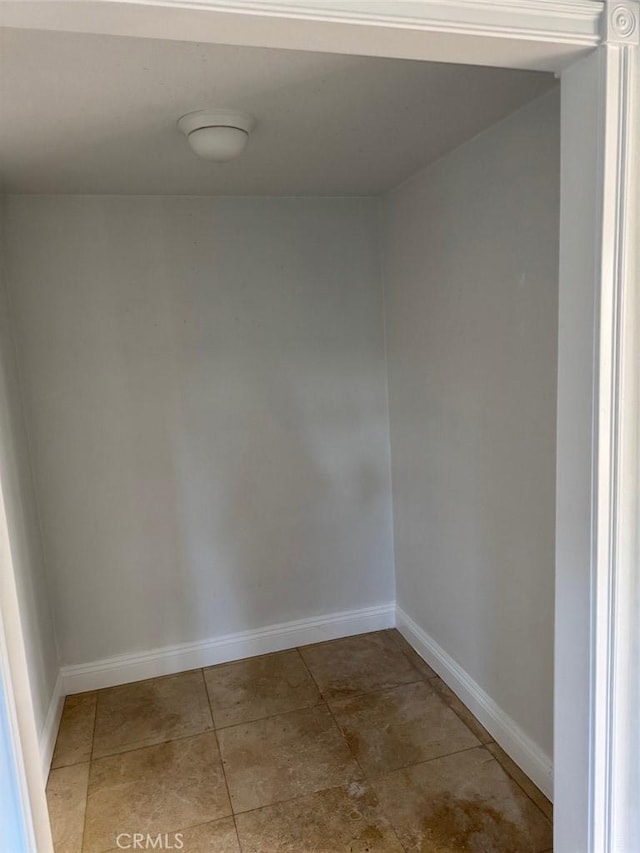 spare room with tile patterned floors