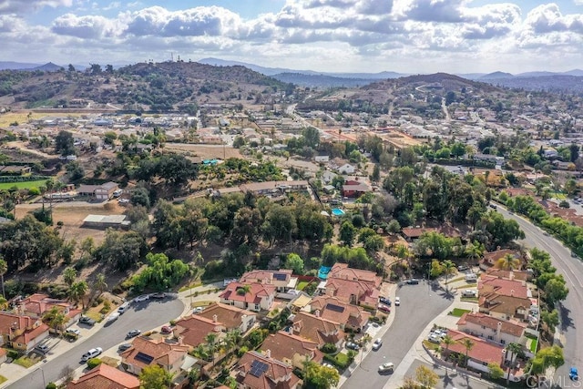 drone / aerial view featuring a mountain view