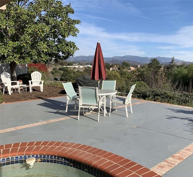 view of patio with a mountain view