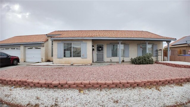 view of front of house with a garage and covered porch