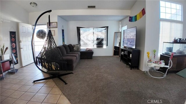 living room featuring tile patterned floors