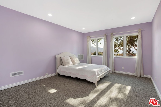 unfurnished bedroom featuring carpet flooring