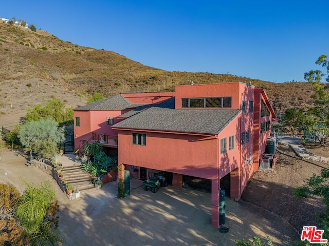 exterior space featuring a mountain view